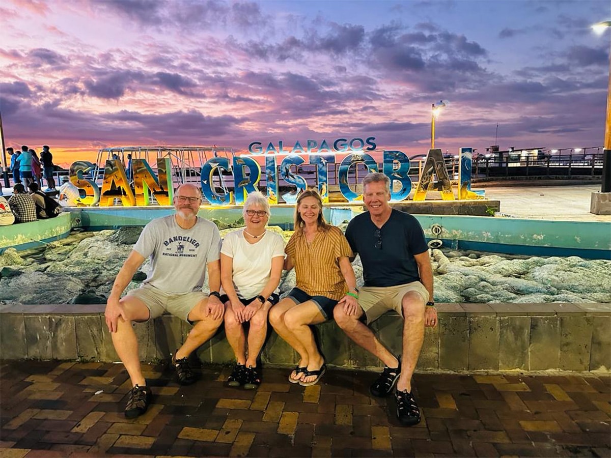 Group of Adults by San Cristobal Sign