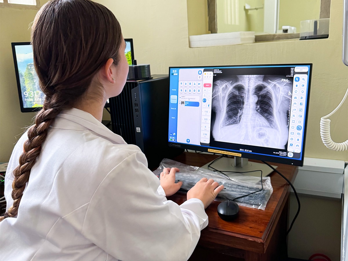 Tanzania Woman looking at xray