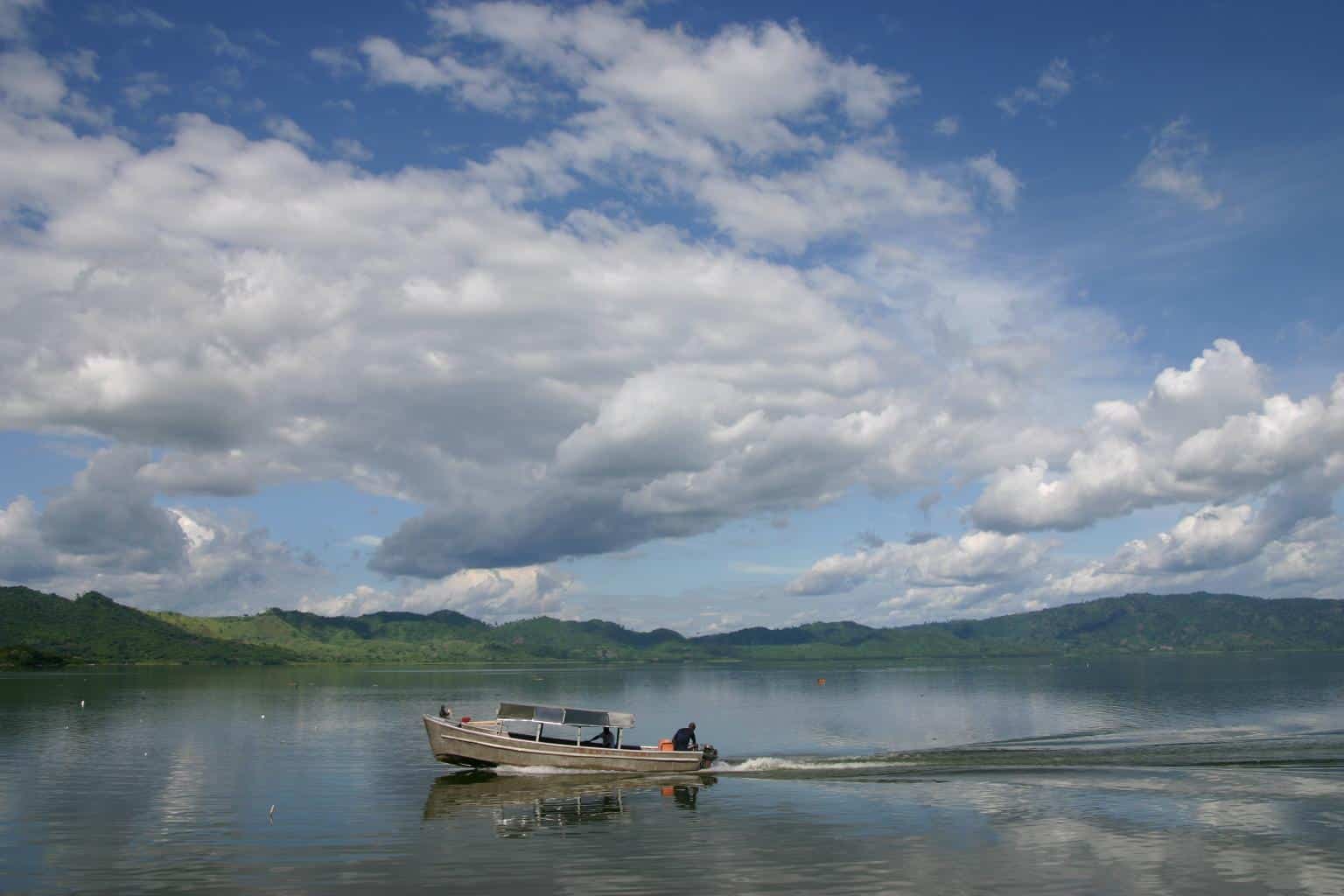 Boat travels along lake in Ghana