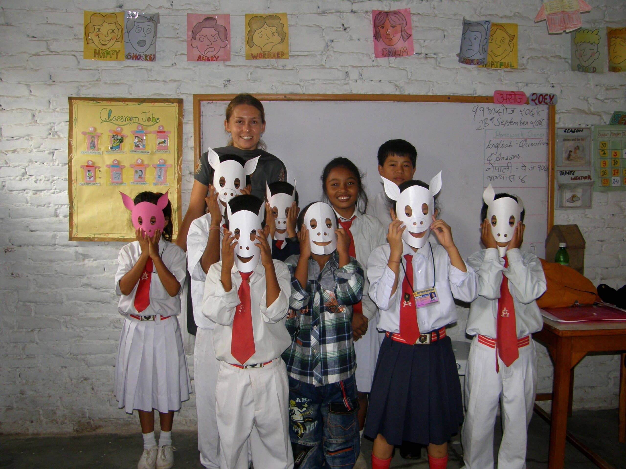 Conservation volunteers in Nepal help with a wildlife education workshop